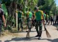 Sinergitas TNI – Polri, Yonkes 1 Kostrad Menggelar Karya Bakti Pembersihan Lingkungan
