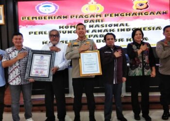 Kombes Bismo Raih Penghargaan dari Komnas PA dan BKKBN