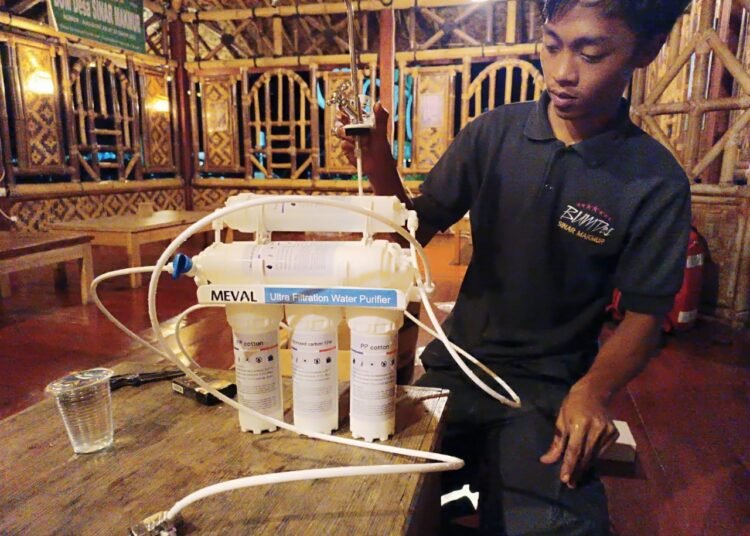 Uji coba water purifier di Situ Rawa Gede